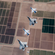 Illustration for article titled These Photos Of Thunderbirds F-16s Flying With F-22 Raptors Is A Whole Lot Of America